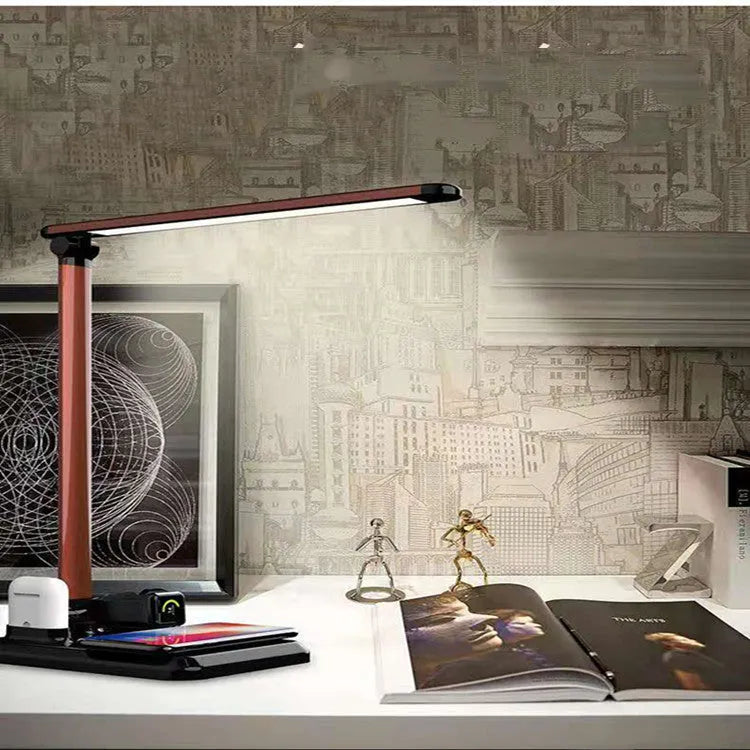 Black and white 4-in-1 LED desk lamp with integrated wireless charging pad and Type-C interface