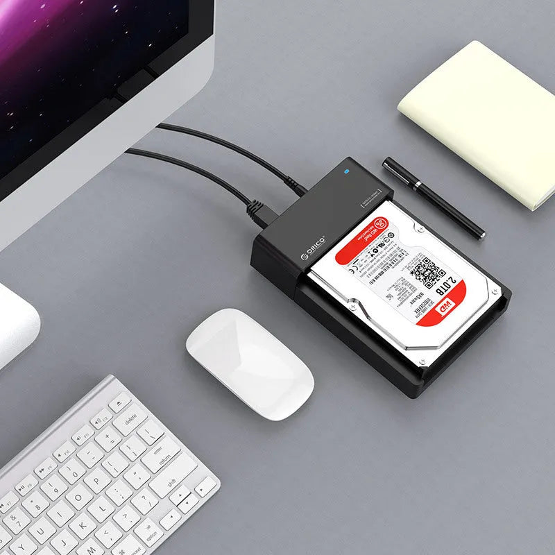 Black universal hard disk enclosure for 2.5-inch and 3.5-inch SATA drives with data cable