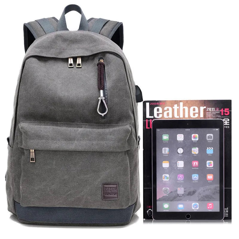 USB rechargeable canvas backpack showing computer pocket and front zipper compartment