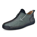Men's black casual Martin boots with a front zip, round toe, and low rubber sole.