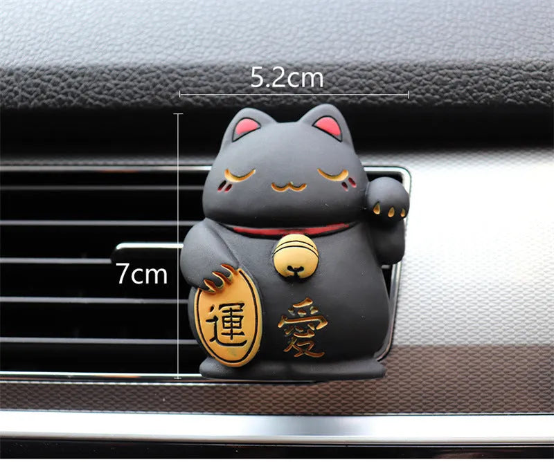 Resin fortune cat car vent aromatherapy clip in black or white.