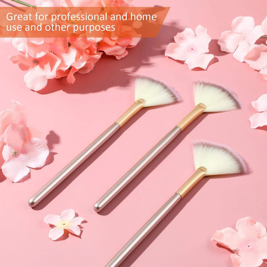 Ten champagne-finished facial fan brushes with acrylic handles and protective covers.