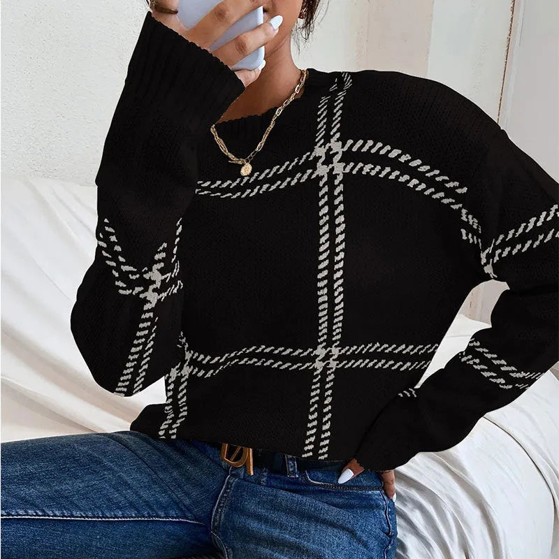 Women's loose-fit plaid sweater with colour-block stripes in acrylic, shown in apricot colour.