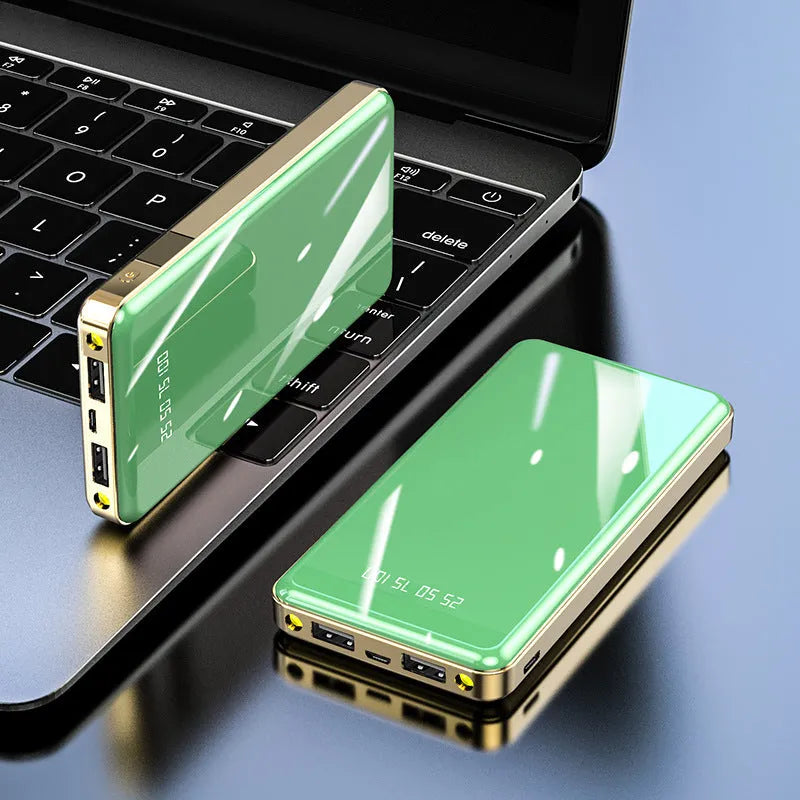 Square black power bank with a mirror digital display showing battery percentage, dimensions 135mm by 68mm.