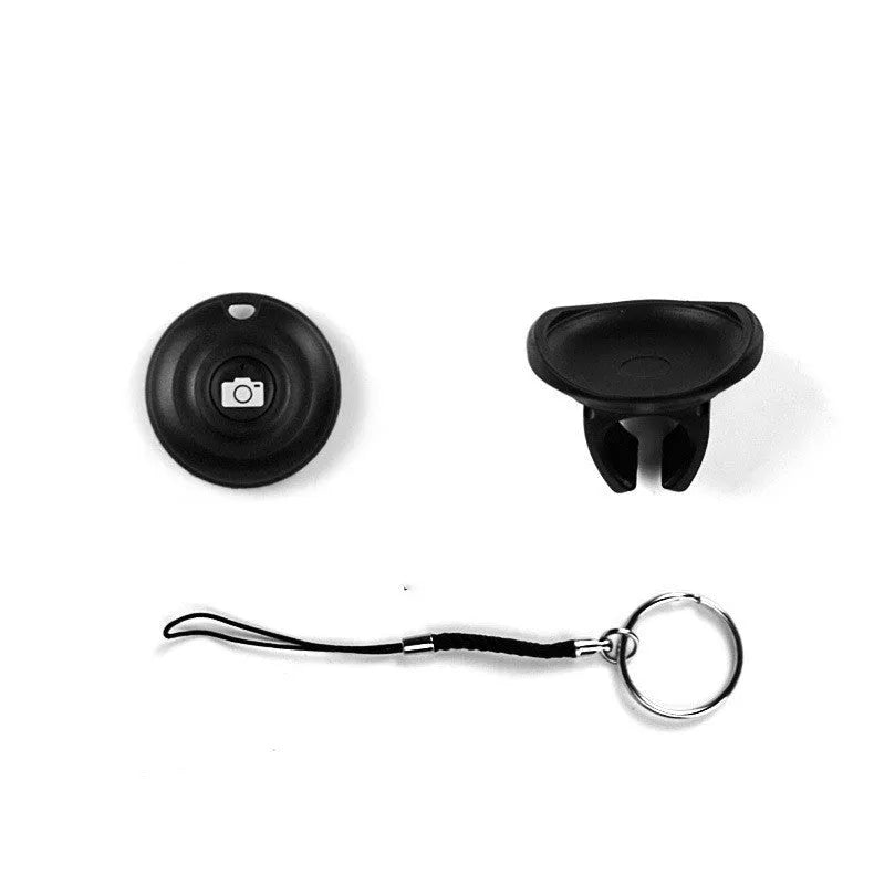 Black Bluetooth remote control for smartphone photography with snap button design