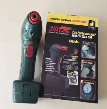 Portable 12V electric car tyre air pump and inflator unit with hose.