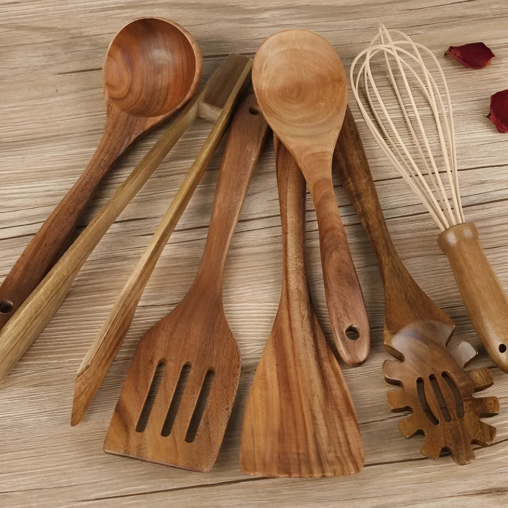 Premium wooden cooking utensils seven-piece set including spoon and spatula on kitchen counter