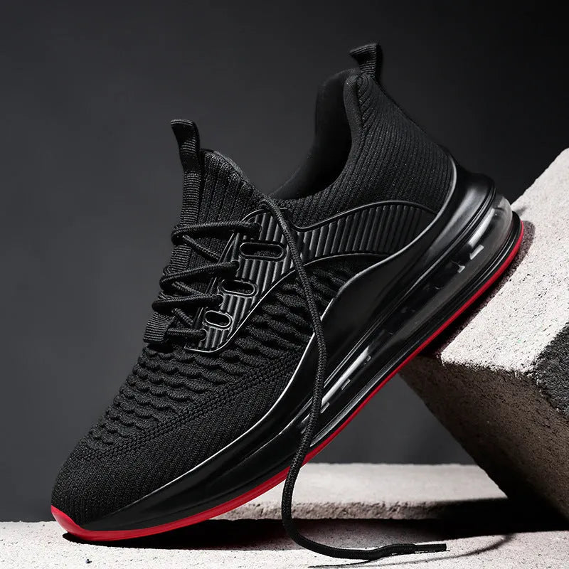 Men's solid-colour low-top mesh running shoes with lace-up front and rubber sole.