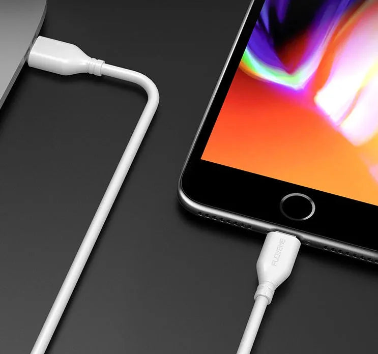 White USB-C to Lightning charging cable for iPhone on a plain background