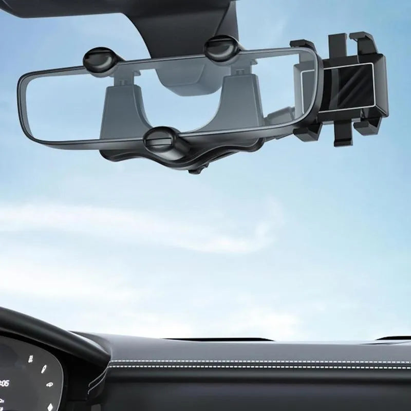 Black rearview mirror car phone holder with telescopic arm and four-claw phone grip, shown in a vehicle.