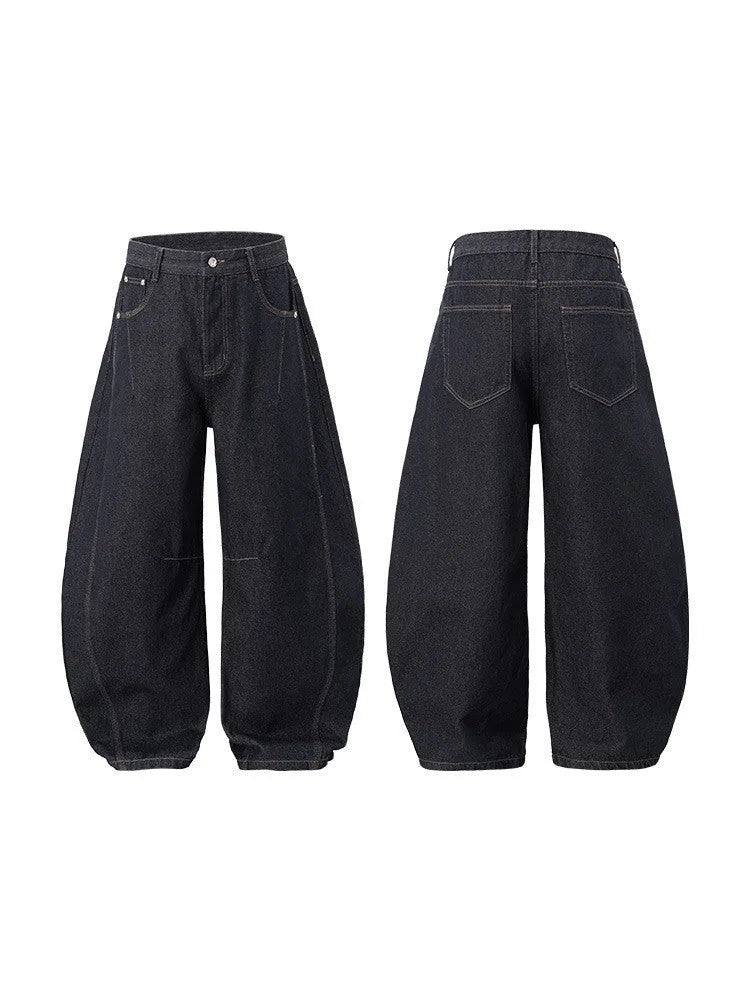 Men's original cow colour wide leg denim trousers on a mid-waist model.