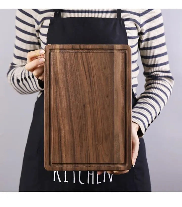 Black walnut wood cutting board with juice groove and engraved handle in three size options