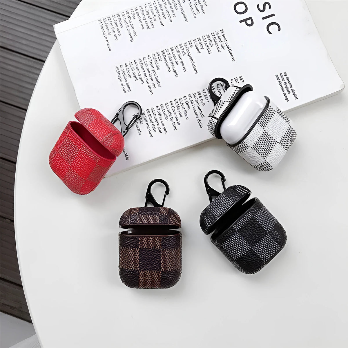 Plastic hard shell iPhone XS MAX case with a grid pattern and an integrated anti-lost hook for Bluetooth headsets.