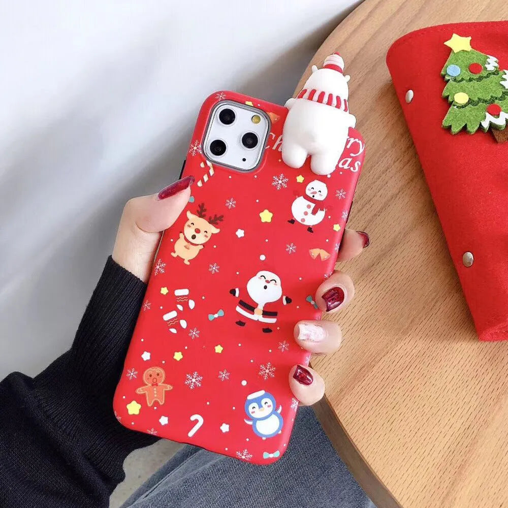Christmas-themed red silicone back cover case for iPhone on a festive background