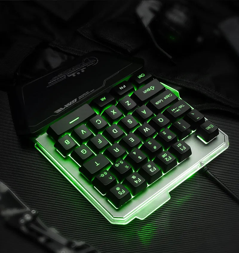 Black G40 one-handed mechanical gaming keyboard with RGB backlit keys on a desktop