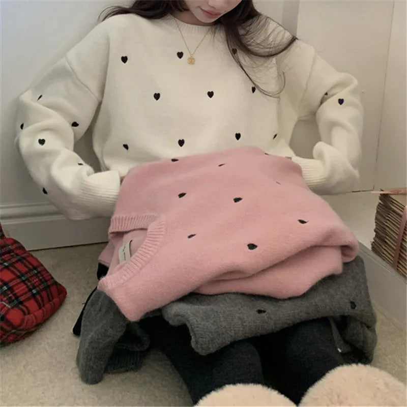Women's loose fit crew neck acrylic sweater with embroidery detail in milky white colour