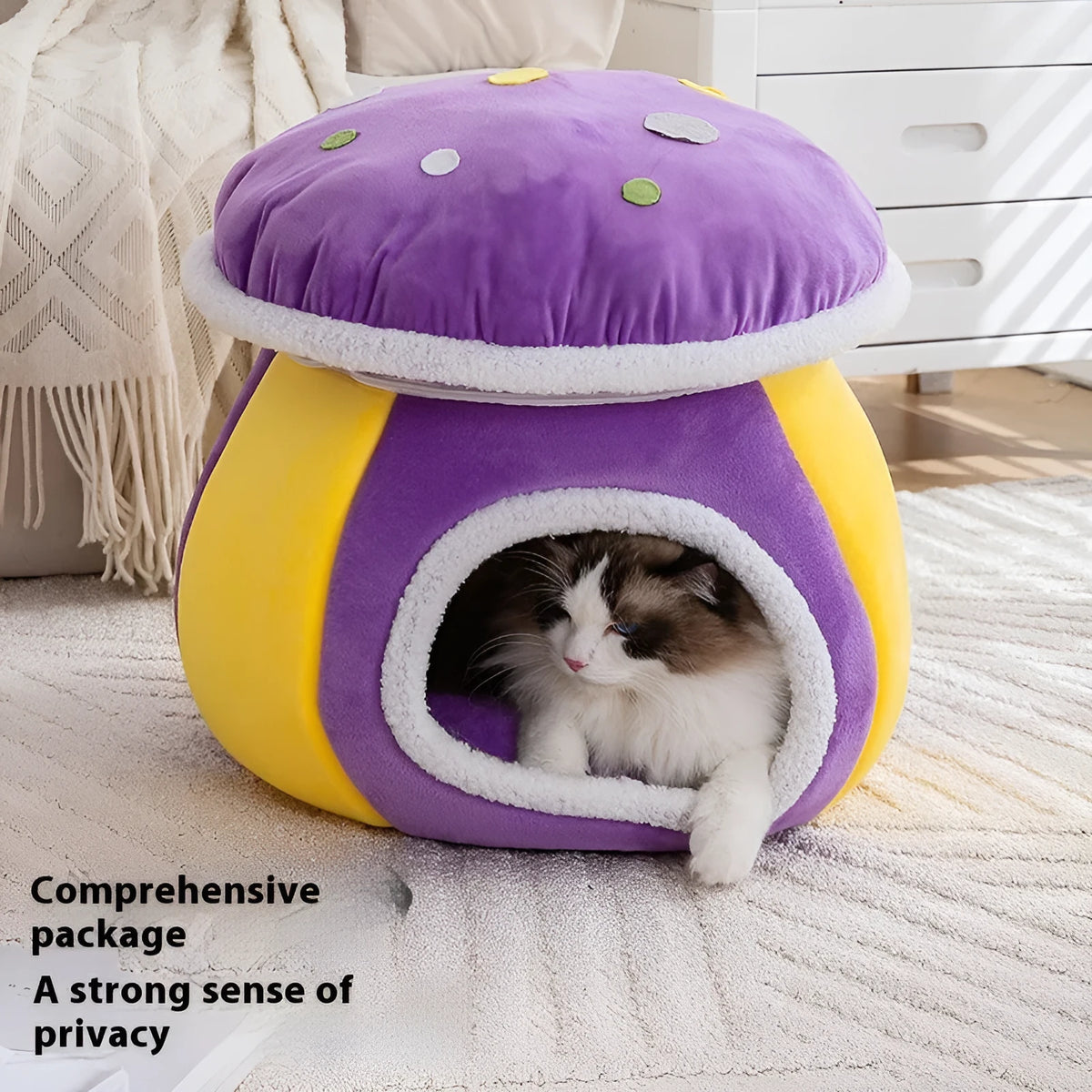 Mushroom-shaped cat bed in plush material available in purple, pink and grey colours