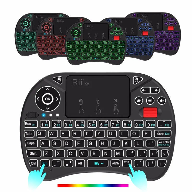 i8X black wireless keypad with QWERTY keyboard, touchpad, dual mouse buttons, USB adapter, and lithium battery