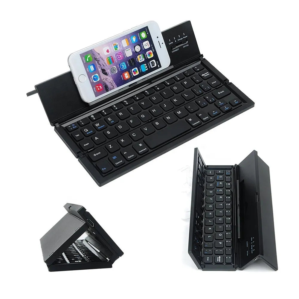 Black mini folding Bluetooth keyboard with bamboo pattern beside 7-inch tablet