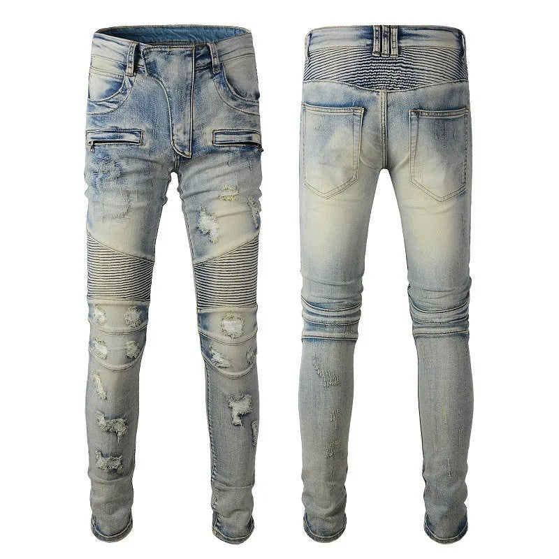 Light blue men's slim fit distressed jeans with hand-frayed details on a mid waist, showing a light straight leg cut.