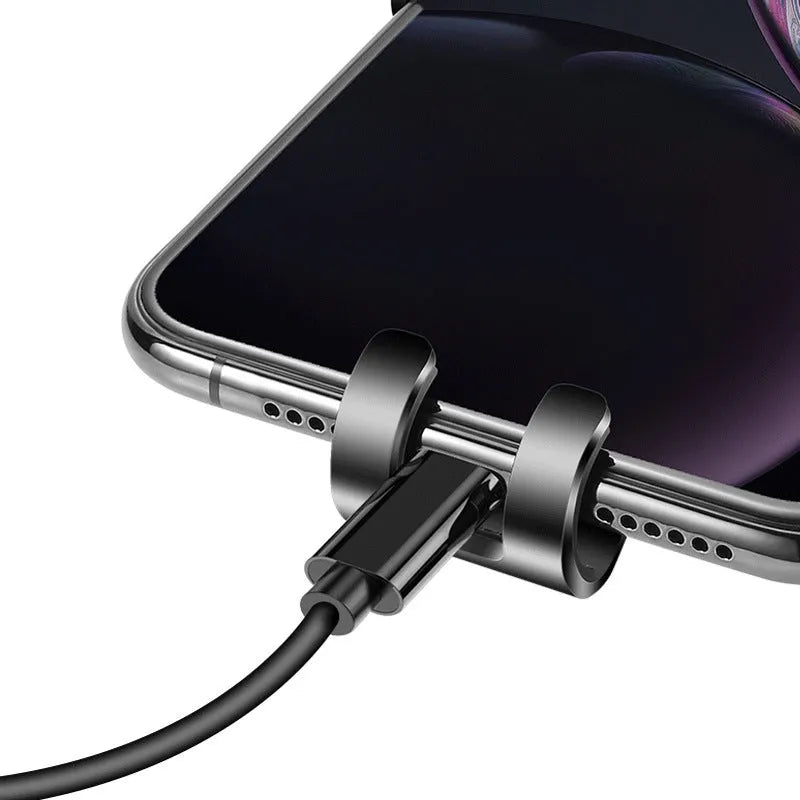 Black ABS gravity mirror phone bracket clipped onto a car air vent.