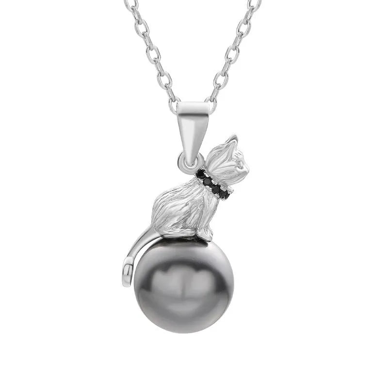 Sterling silver cat pendant necklace on a chain, elegant clavicle style.
