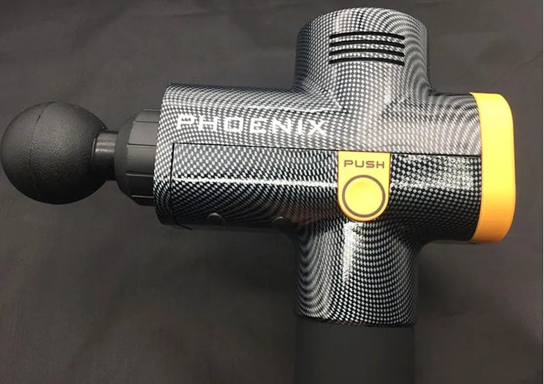 Black deep tissue fascia massage gun with four removable heads on a grey background