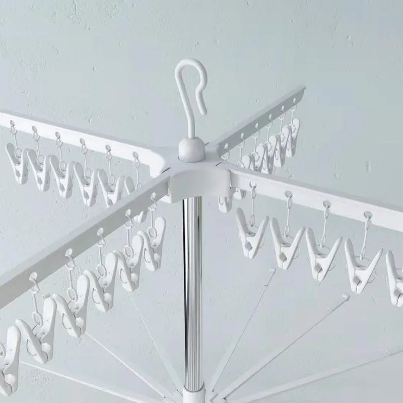 Stainless steel three-layer drying rack with plastic clips for socks, trousers, and tie drying