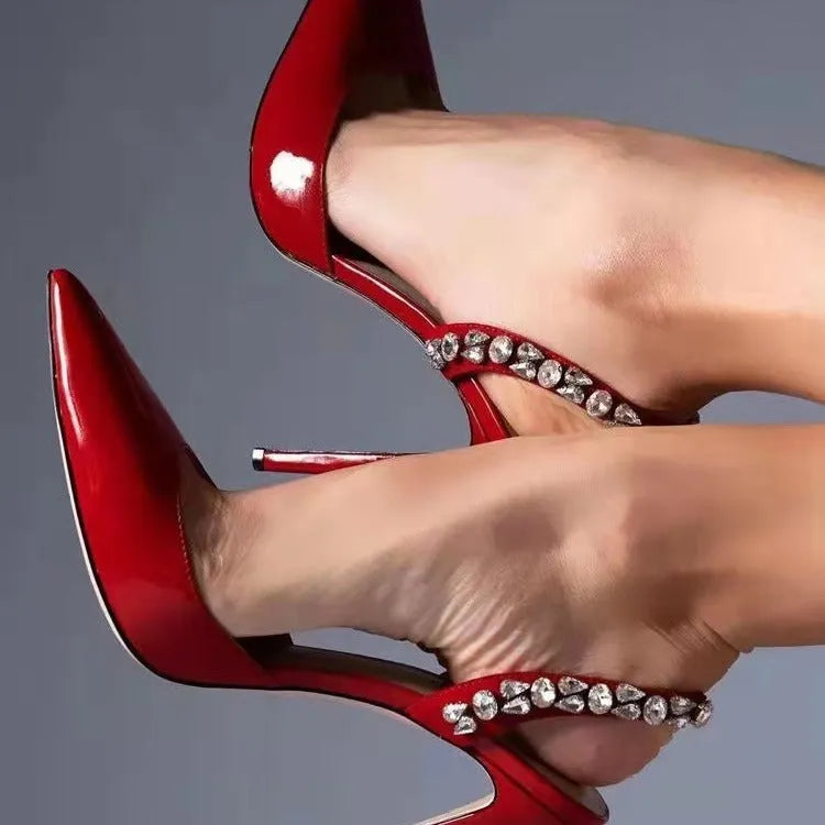 Women's black patent leather pointed-toe high heel sandals with side rhinestone detailing on an 11cm heel.