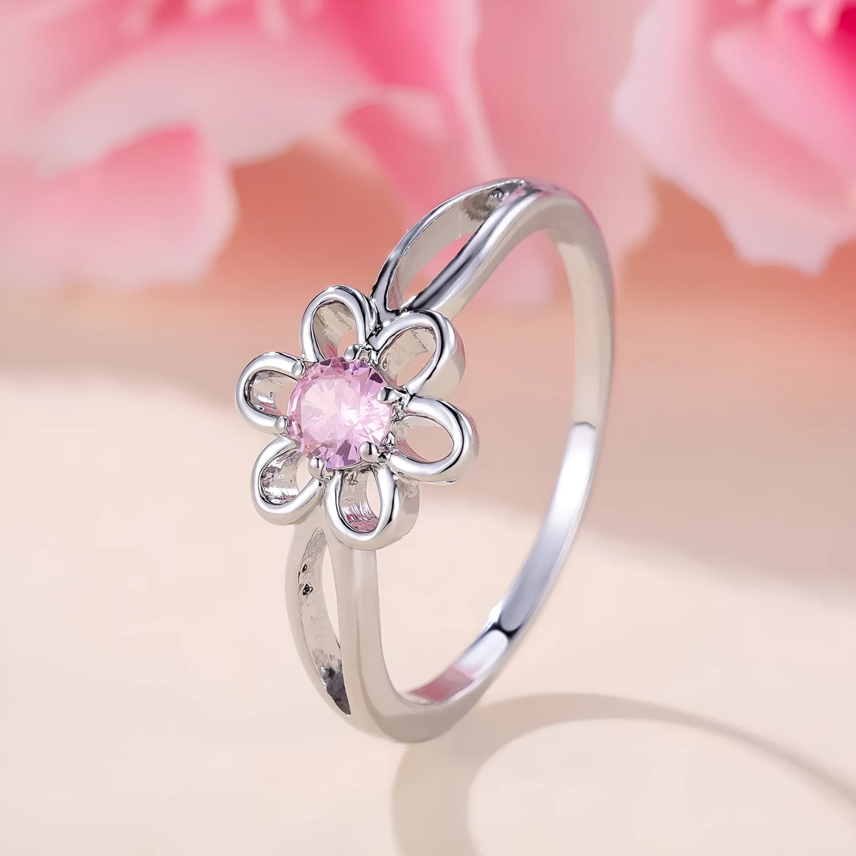 Women's hollowed flower fashion ring in copper with electroplated finish on a size chart.
