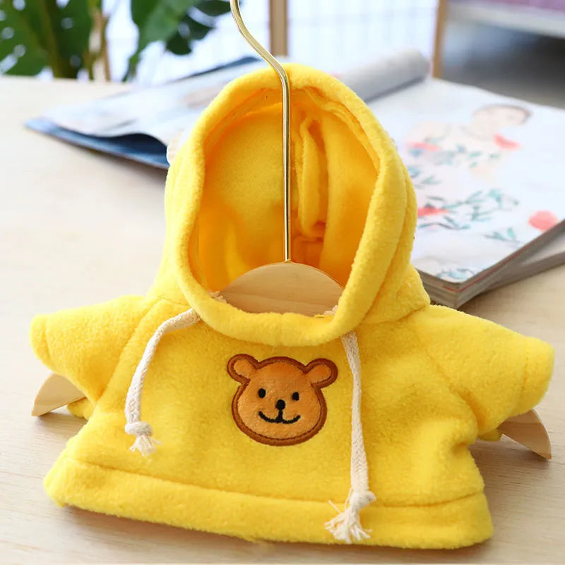 Dog wearing blue hooded sweater from pet clothing range with 23cm and 42cm sizes