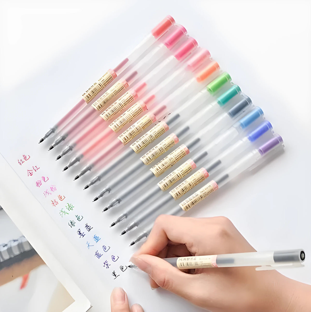 Set of twelve black Muji gel pens with 0.5mm fine tips and ink prevention mechanism