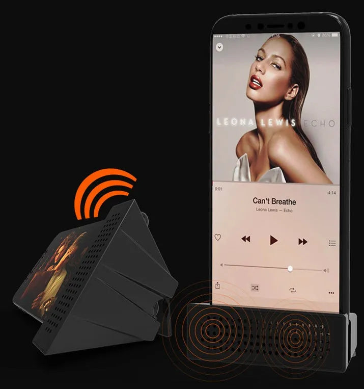Mini black ABS mobile phone amplifier bracket holding an iPhone on a desktop.