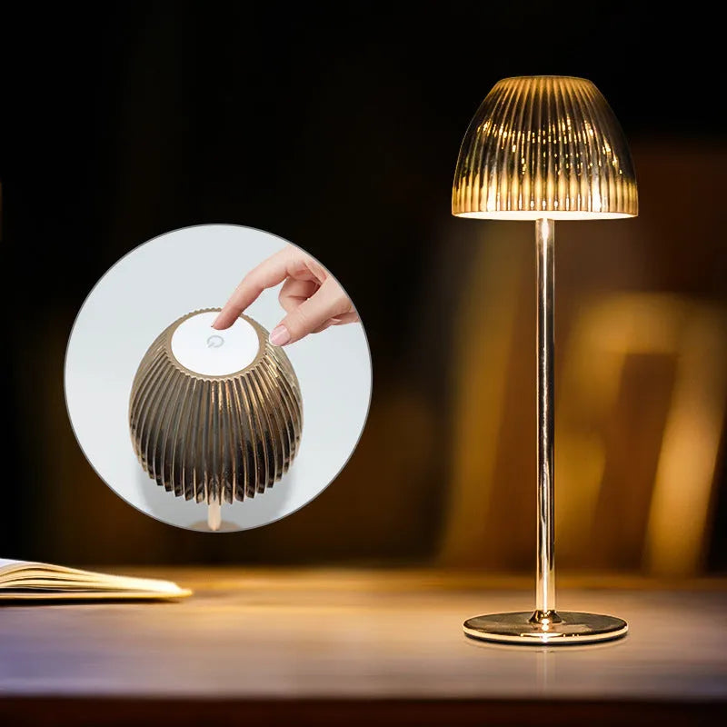 Ins pattern dimming small night lamp in thin round base black or white on a table.