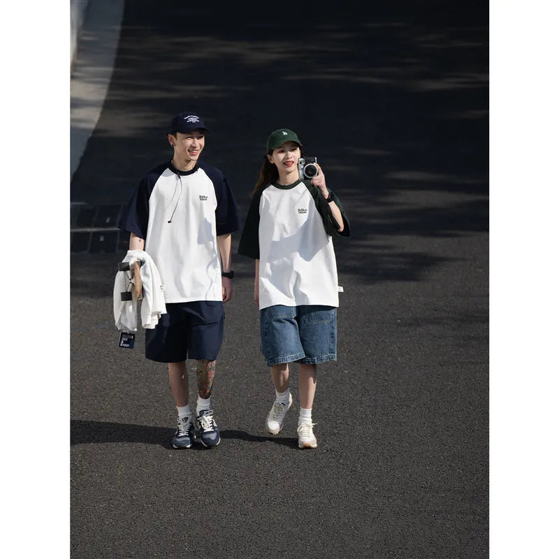 Men's blue Japanese-style raglan sleeve t-shirt with loose fit on hanger