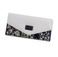 Open view of a large capacity three-fold women's wallet showing multiple card slots and a zipped coin purse.