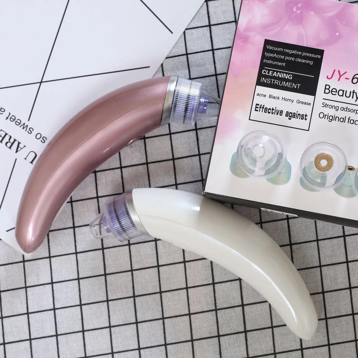 JY-666 electric blackhead suction instrument in rose gold or white colour for facial pore cleaning