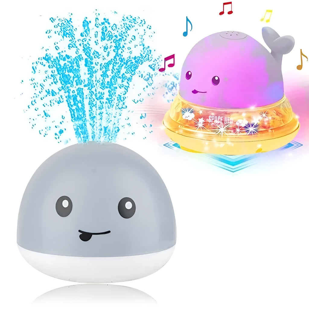 Automatic spray whale baby bath toy with LED lights on a blue base