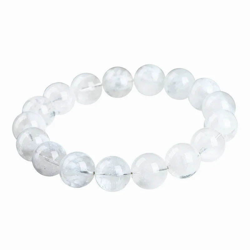 Women's crystal bracelet with round blizzard snowflake beads and ruyi xiangyun charm.