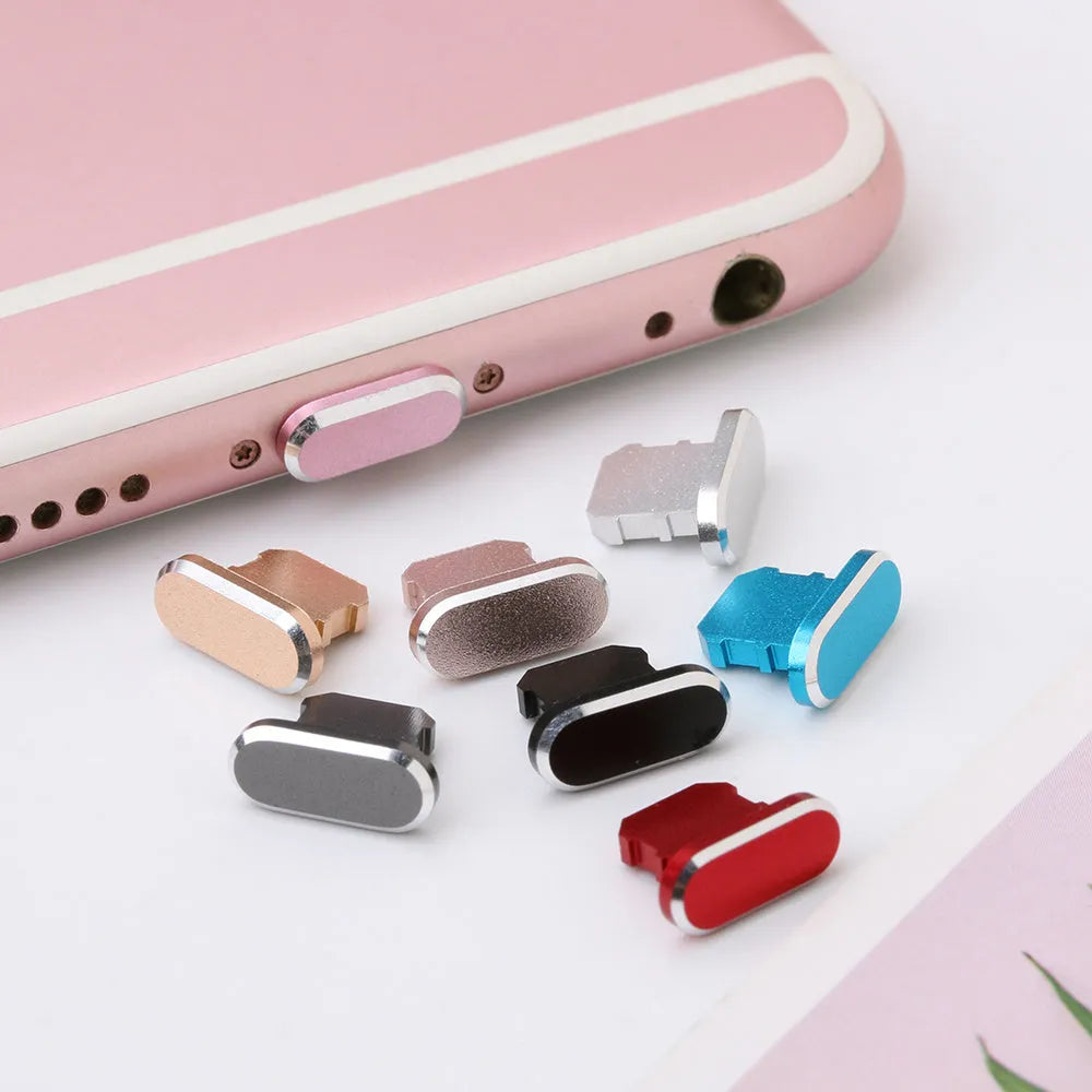 Aluminium alloy dust plug for iPhone charging port in various colours including gold and rose gold.
