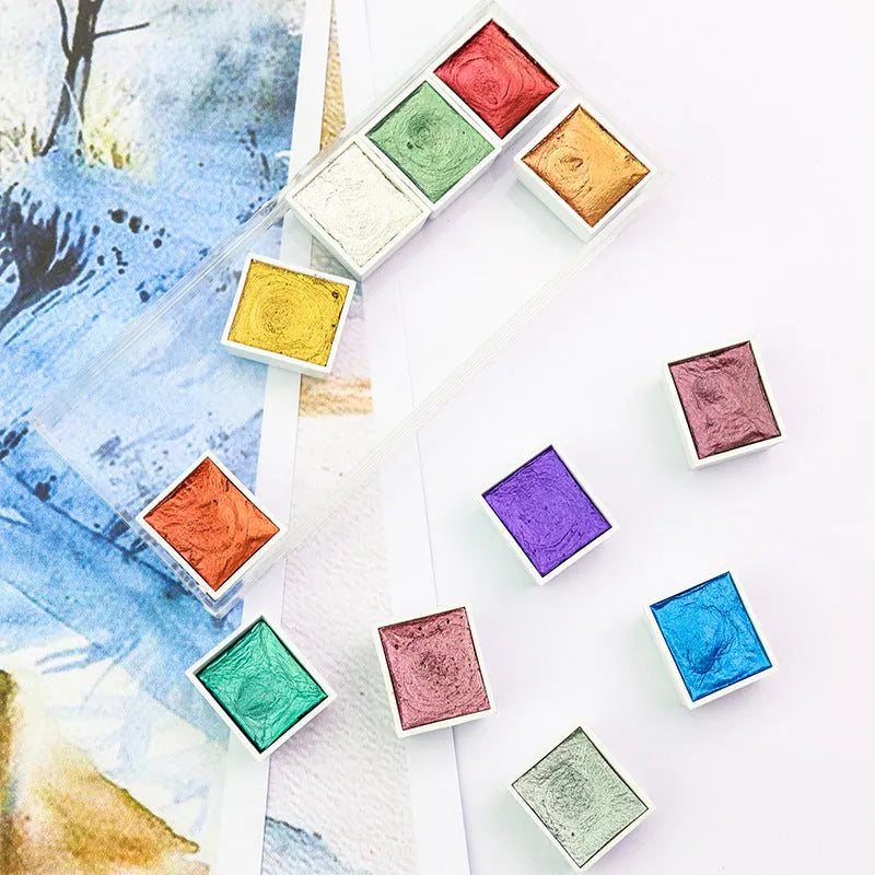 Solid watercolour pigment set showing pearlescent colour blocks measuring 17mm x 20mm x 10mm in boxed packaging