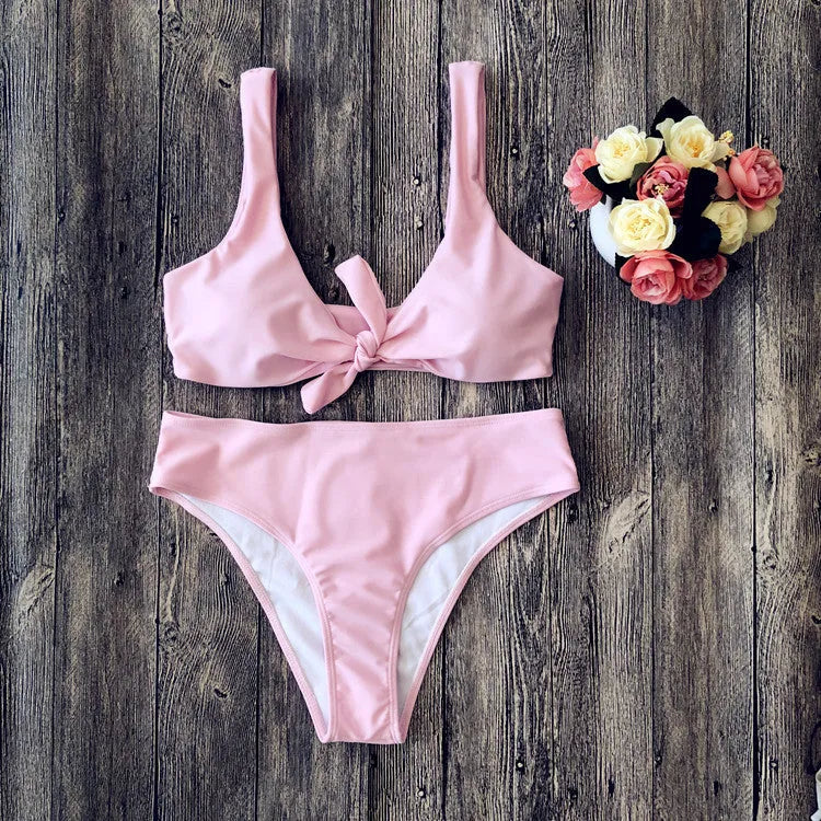 Women's solid colour polyester bikini swimsuit set in black, pink, red, white, or wine red.