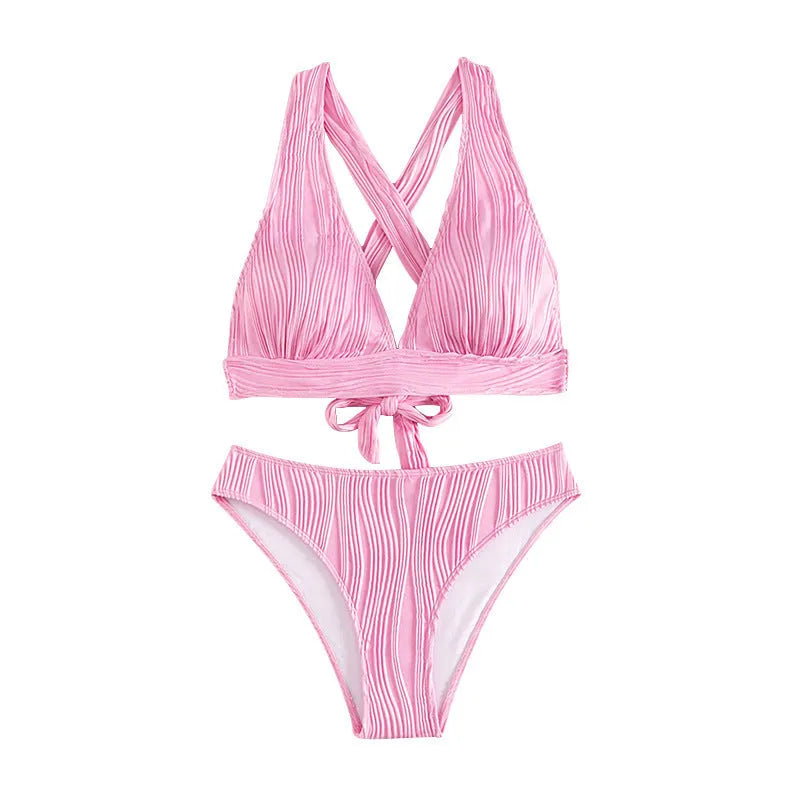 Women's halter strap bikini in black or pink with matching top and shorts