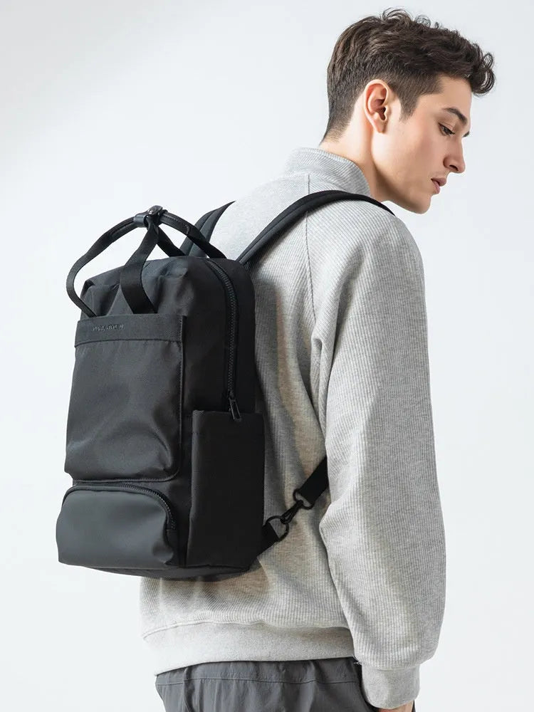 Black Oxford cloth computer backpack with a 20-35 litre capacity for laptop storage.