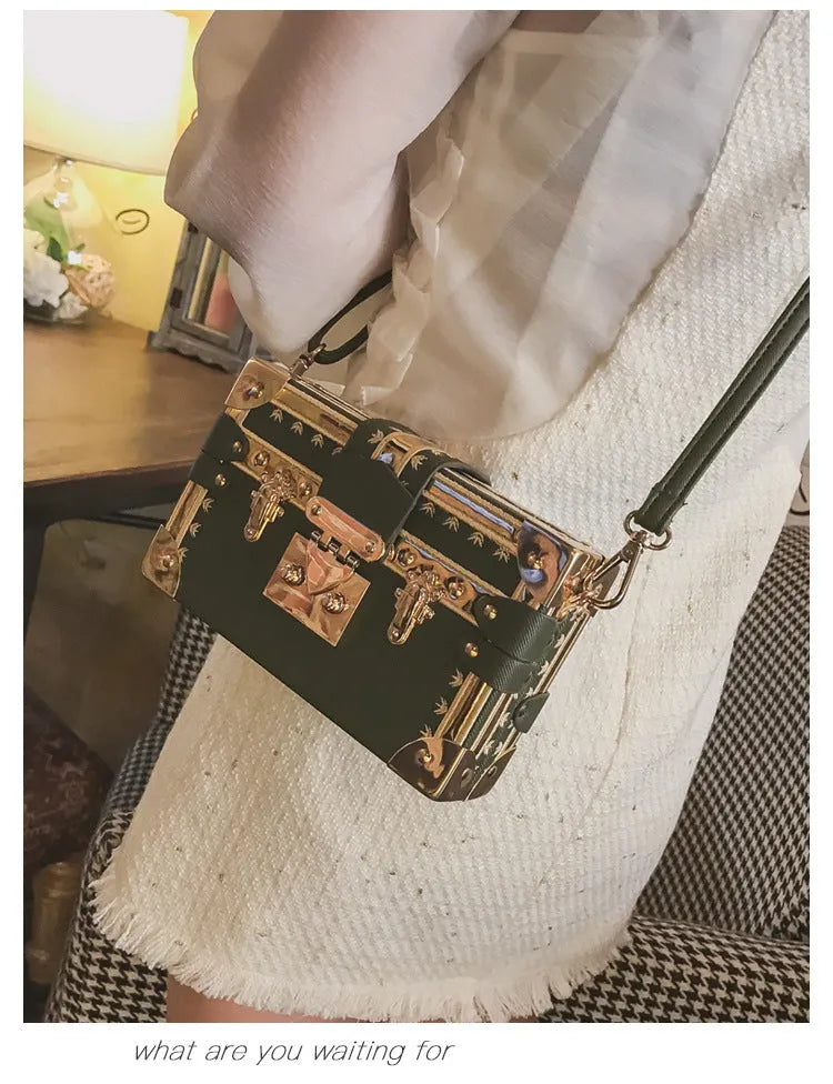 Hard structured PU shoulder bag with flap design and metal hasp closure