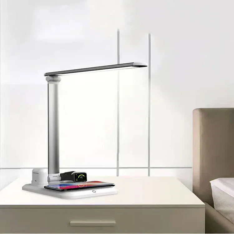 Black and white 4-in-1 LED desk lamp with integrated wireless charging pad and Type-C interface