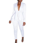 Women's white ruffled top and pencil pants business suit set on a hanger.