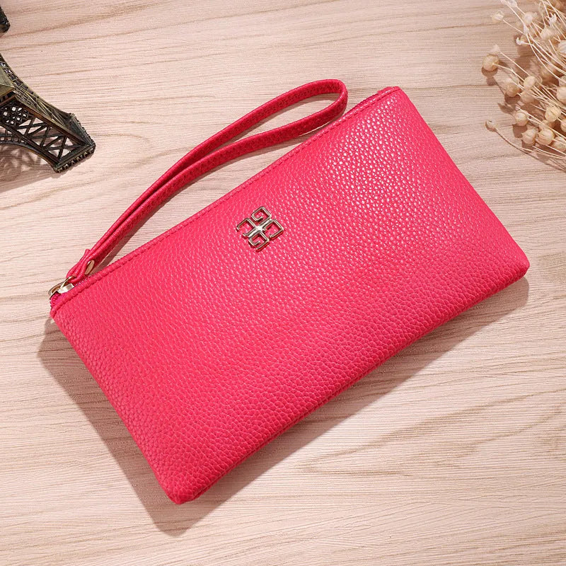 Long 55-inch PU leather phone wallet handbag with zip closure in a solid colour