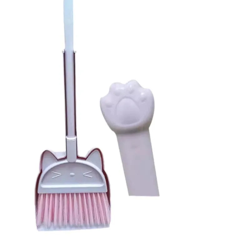 Purple broom and dustpan set with rotating brush holder on plastic handle