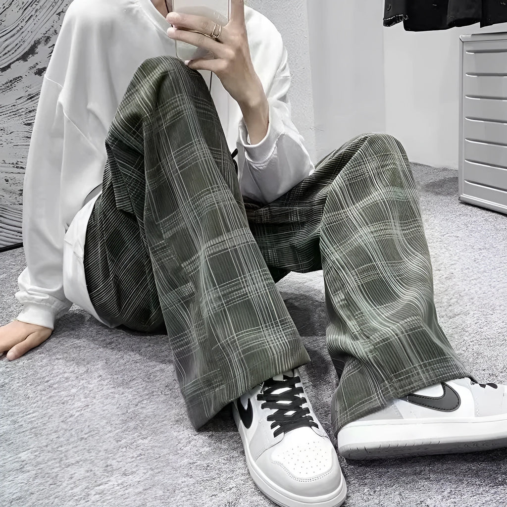 Black and green plaid casual trousers with straight-leg cut and mid-waist design